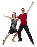 Man and woman dancing salsa against a white background