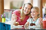 Mother And Daughter Having Lunch Together At The Mall