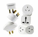 Stack of Power Adaptors on White Background