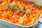 tomatoes baked with mozzarella cheese and pancetta