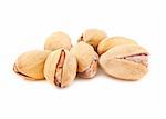 Toasted pistachios isolated on a white background