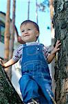 Close-up portrait of a smiling baby at the park