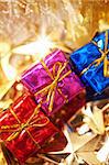 colorful gift boxes with decoration in gold