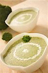 Rich vegetable broccoli soup with cream garnish