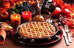 Apple pie for Thanksgiving with wine and grapes