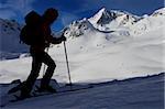 Silhouette of mountaineer. Outdoor winter activity