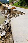 Destroyed road landslide damaged in powerful flood