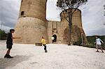 Boys Playing Soccer In Front Of Castle Fort