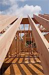 Low angle view of roof rafters of a house