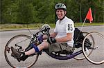 Man with spinal cord injury participating in a handcycle race