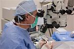 Ophthalmologist making incision during cataract surgery