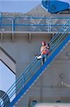Engineer standing on a staircase at a materials plant