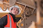 Engineer inspecting an earth mover