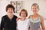 Portrait of three friends smiling