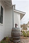 Rain barrel at a Green Technology Home for rainwater harvesting and reuse