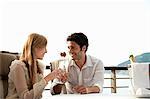 Young couple toasting with champagne