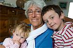 Grandmother with young grandchildren, portrait