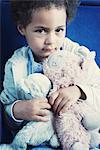 Little girl hold stuffed toys, portrait