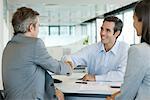 Businessman shaking hands with client