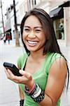 Smiling Woman with Cell Phone