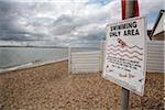 Swimming Area Sign on Pebble Beach