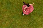 Woman spinning outdoors