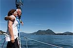 Older couple standing on boat together