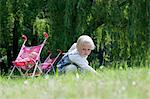 Blond girl on a flower meadow