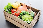 Wooden crate of fresh vegetables