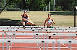 Runners In Hurdling Race