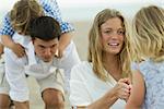 Family playing at the beach