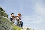 Parents and young boys in nature