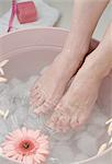 Woman taking footbath