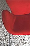 Red armchair on rug