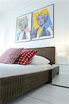 Modern bedroom with pop art above the bed