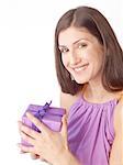 Happy woman holding wrapped gift