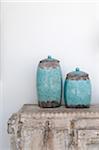 Two earthenware jugs on dresser