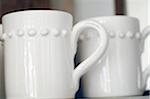 Two white coffee mugs