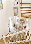 Floor with staircase and large photograph of a boy