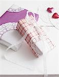 Wrapped gifts with hearts