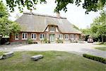 Country house with thatched roof