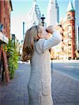 Girl Looking Through Binoculars, Front Street, Toronto, Ontario, Canada