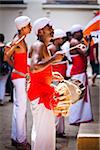 Drummers inside Temple of the Tooth during Kandy Perehera Festival, Kandy, Sri Lanka