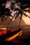 SUNSET LIGHT OLD WOOD BOATS BEACH OCEAN AND PALM TREES PETIT PITON SOUFRIERE HARBOR ST. LUCIA WEST INDIES