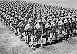 1940s ROWS OF USA INFANTRYMEN MARCHING