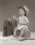 1950s BABY BUSINESSMAN IN DIAPER WITH HAT BRIEFCASE SALESMAN SAMPLES PAPERWORK