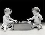 1930s - 1940s TWIN BABIES PLAYING GAME OF CHECKERS TOGETHER STUDIO