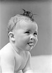 1940s CUTE BABY STICKING OUT TONGUE STUDIO