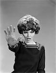 1960s ANGRY WOMAN HAND HELD OUT AS STOP HALT GESTURE