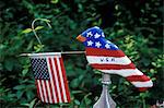 FOLK ART PAINTED PATRIOTIC BIRD AND MINIATURE AMERICAN FLAG